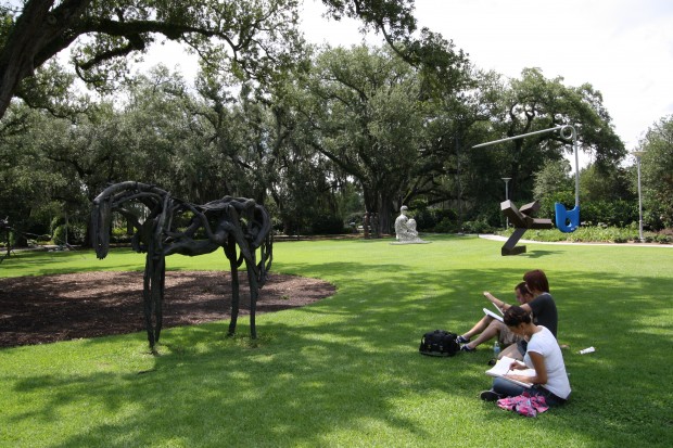 Students sketching in the sculpture garden